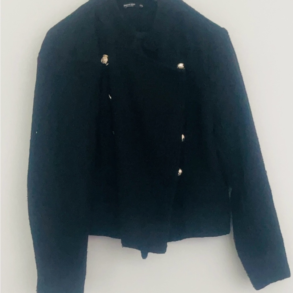 Double breasted pleaded black jacket with gold buttons